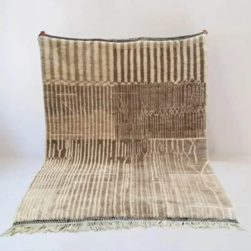 Hand-knotted Moroccan Beni Mrirt rug named Zelora, featuring a luxurious abstract design in neutral brown and taupe tones, made from 100% wool. Perfect for contemporary spaces, this area rug blends Moroccan heritage with modern elegance.