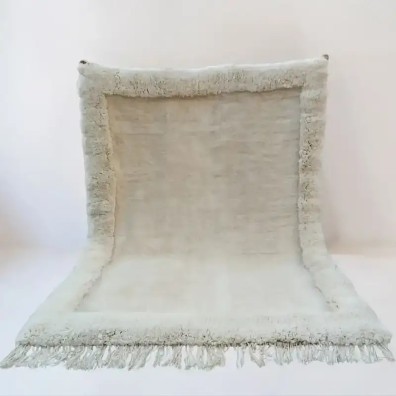 Ivory Beni Mrirt rug with a thick shaggy border, handwoven from premium wool, ideal for minimalist decor.