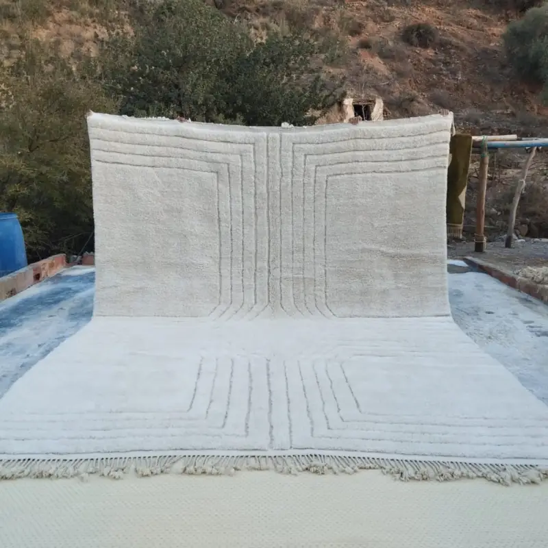 Custom Moroccan Beni Mrirt rug featuring a minimalist linear design in soft neutral tones.