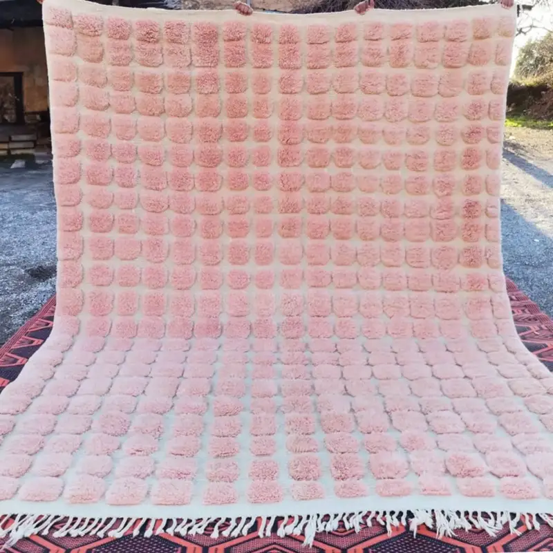 Handmade Moroccan Beni Mrirt rug named Tafsut with a soft pink grid pattern, crafted from 100% wool, exuding elegance and warmth