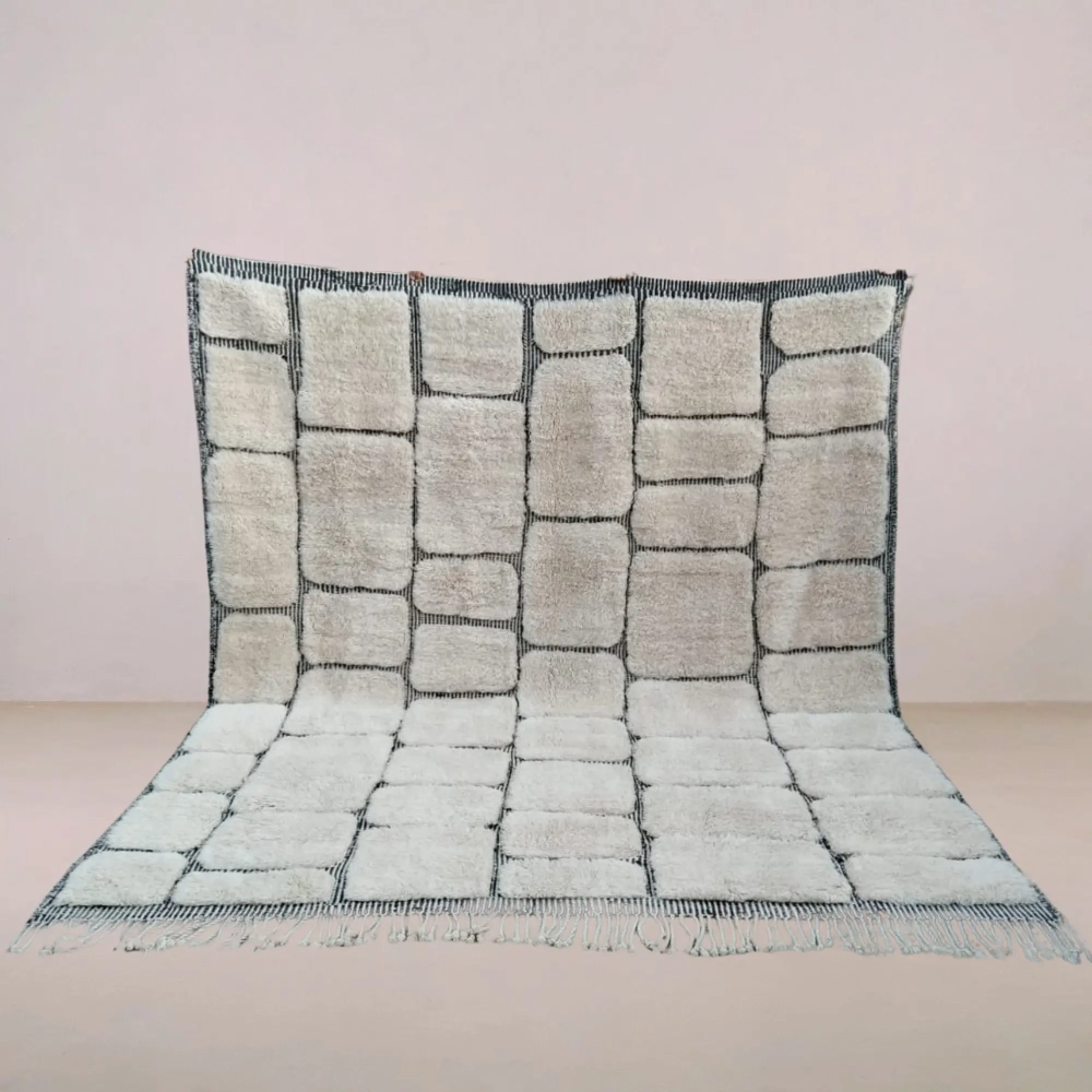 Handmade Moroccan Beni Mrirt rug with a checkered design in neutral tones, crafted from premium wool for a soft and luxurious feel.